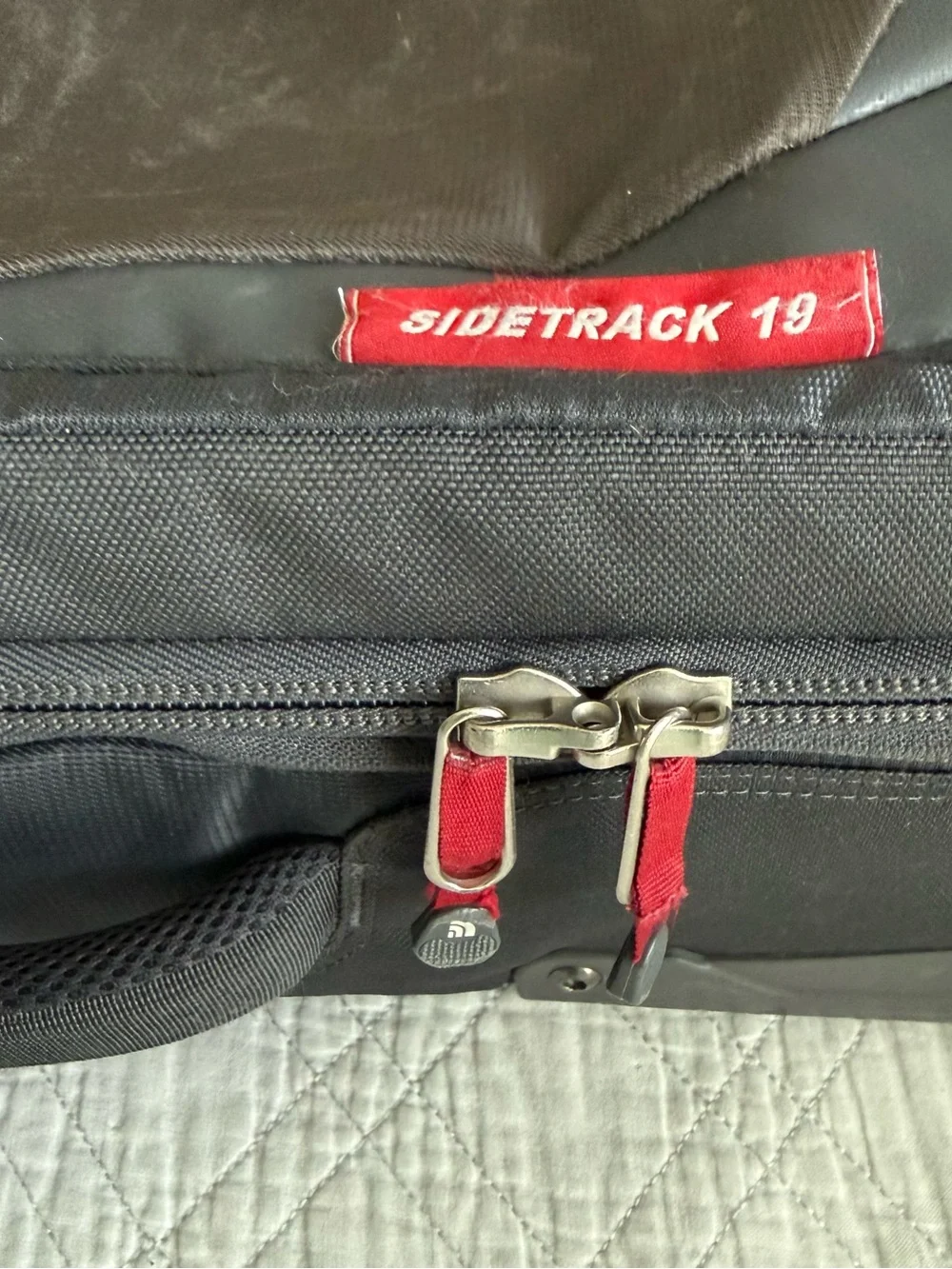The North Face compact rolling